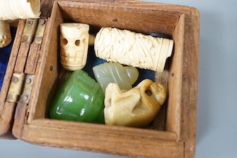 A group of 19th century ivory carvings, carved mineral buddha, monkey etc